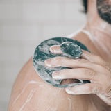 Man using Bod scrub 