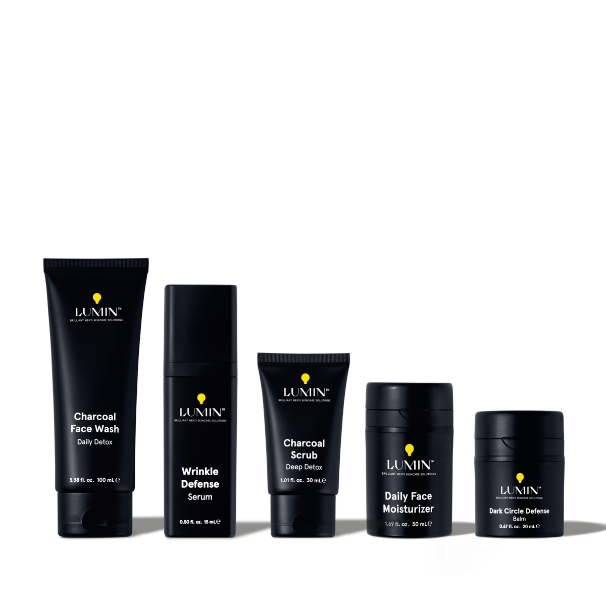 Lumin men's skincare set with Charcoal Face Wash, Wrinkle Defense Serum, Charcoal Scrub, Daily Face Moisturizer, Dark Circle Defense Balm