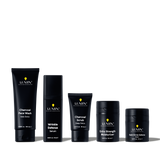 Lumin men's skincare set including charcoal face wash, wrinkle defense serum, charcoal scrub, extra strength moisturizer, and dark circle balm.