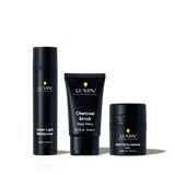 Lumin men's skincare set with Super Light Moisturizer, Charcoal Scrub Deep Detox, and Dark Circle Defense Balm.