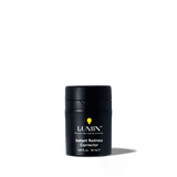 Lumin Instant Redness Corrector skincare product for men, 1.01 fl. oz. black travel-size container with yellow logo.