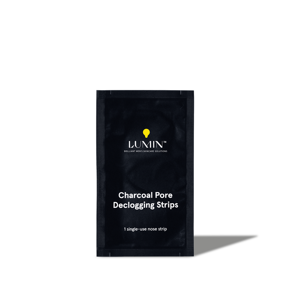 Lumin charcoal pore declogging nose strip for men's skincare, single-use blackhead remover strip packet.