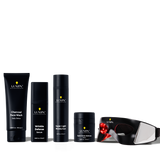 Lumin men's skincare set with charcoal face wash, wrinkle defense serum, moisturizer, dark circle balm, and LED light therapy mask.