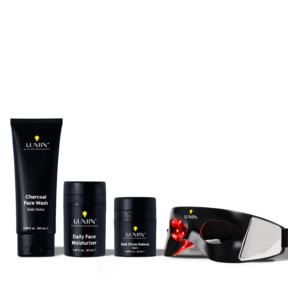 Men's skincare set with charcoal face wash, daily face moisturizer, dark circle defense balm, and LED light therapy eye mask