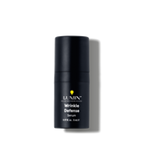 Lumin Wrinkle Defense anti-aging face serum in sleek black bottle for men’s skincare routine